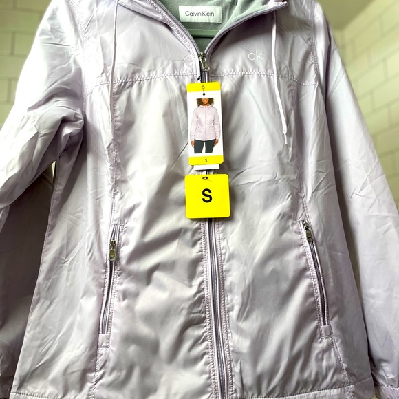 *NWT* Lt weight, lined, hooded CK windbreaker in lilac. Size small. - Picture 5 of 5